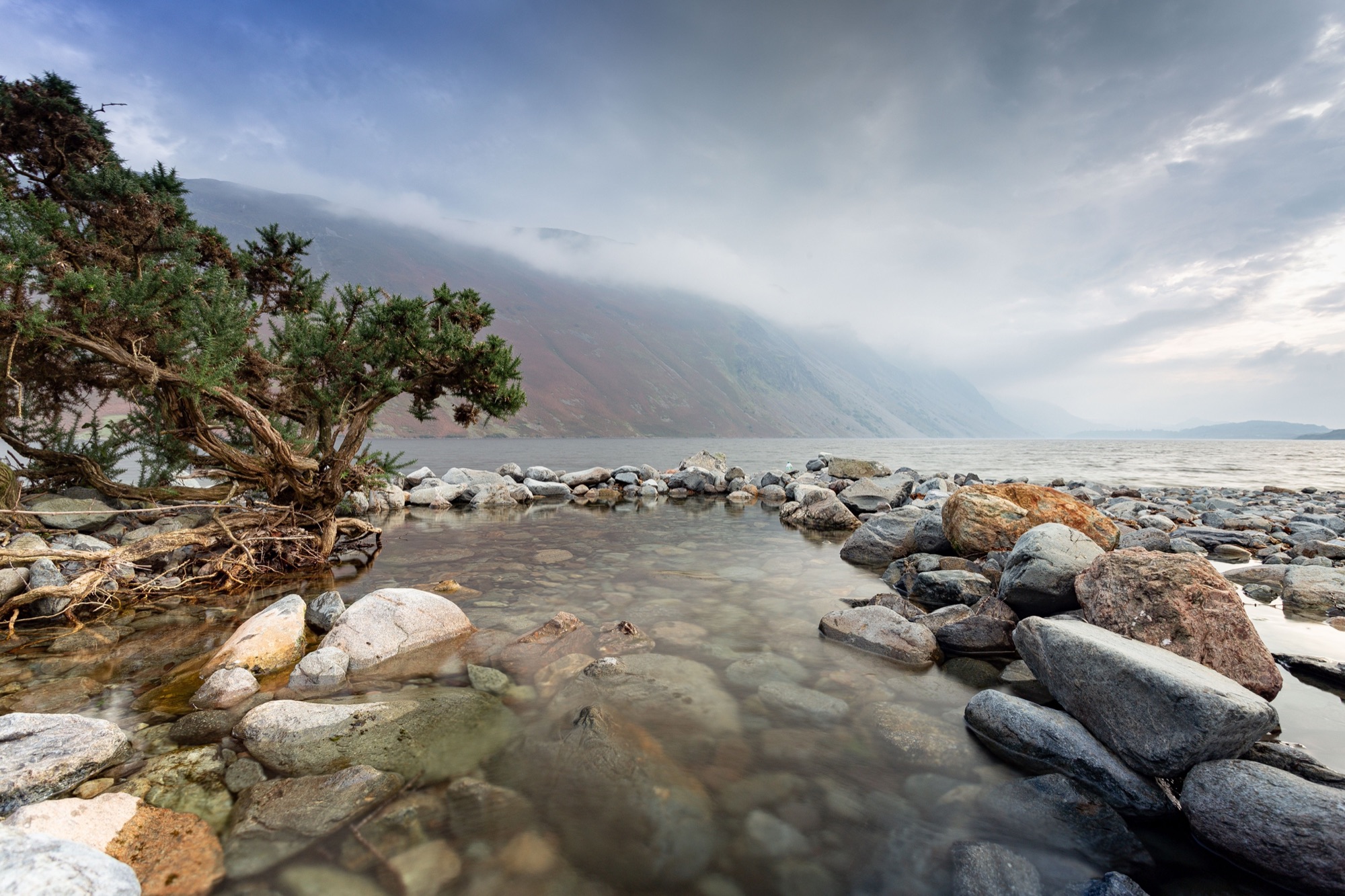 The Screes across the water at Wastwater, seen through mist