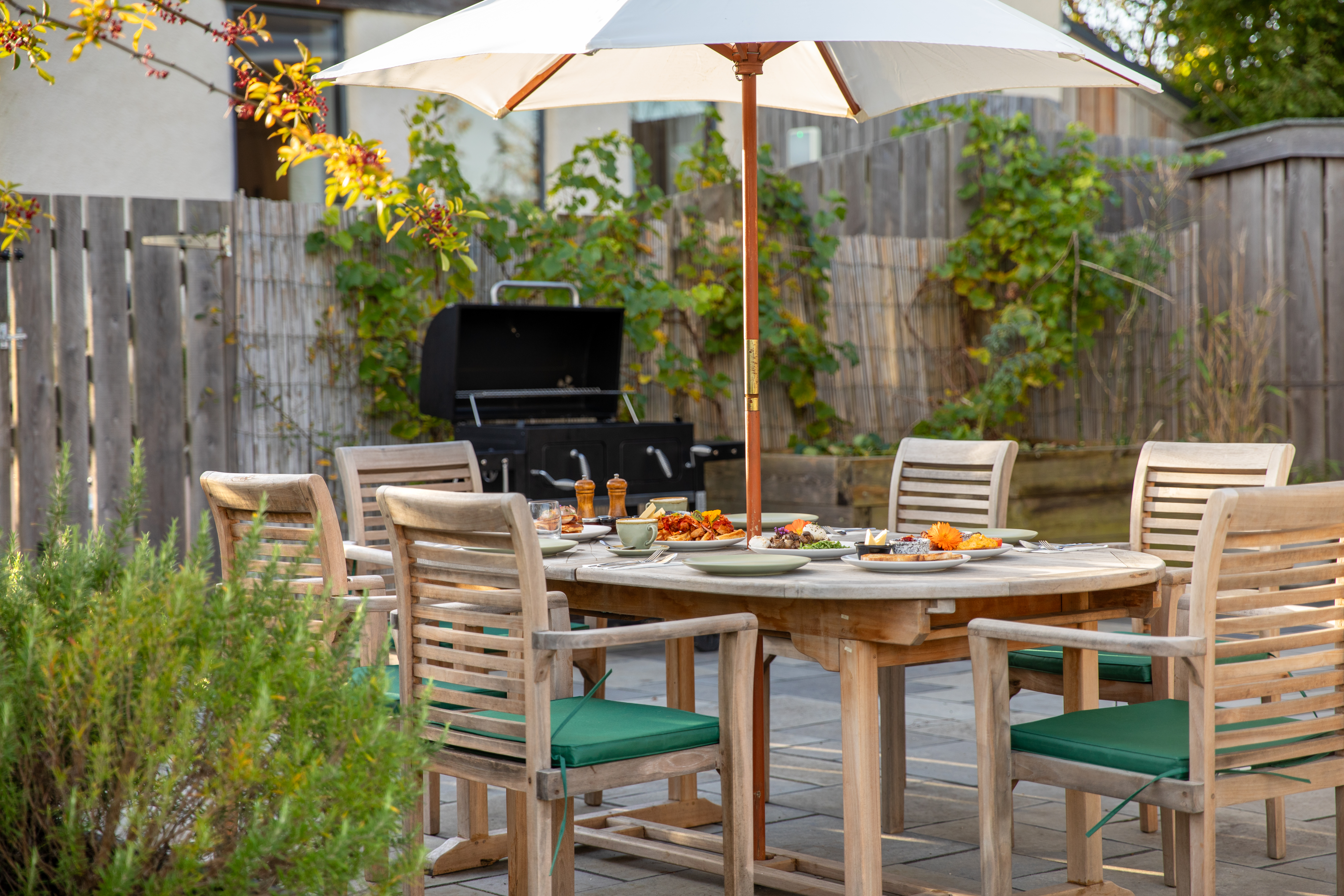 Alfresco dining at The Weston Farmhouse with countryside views, Weston Devon