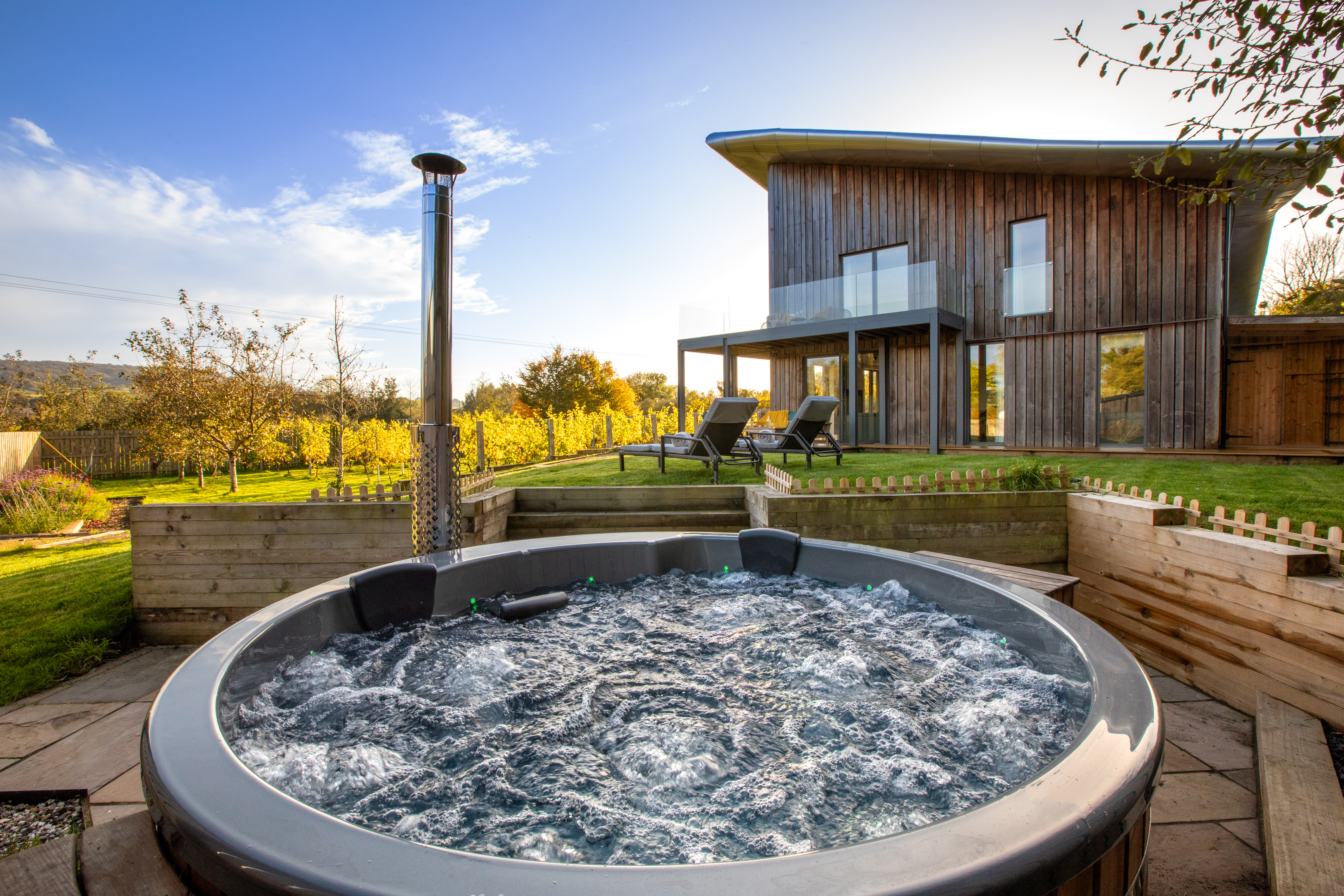 The wood-fired hot tub at The Weston Farmhouse, Weston Devon