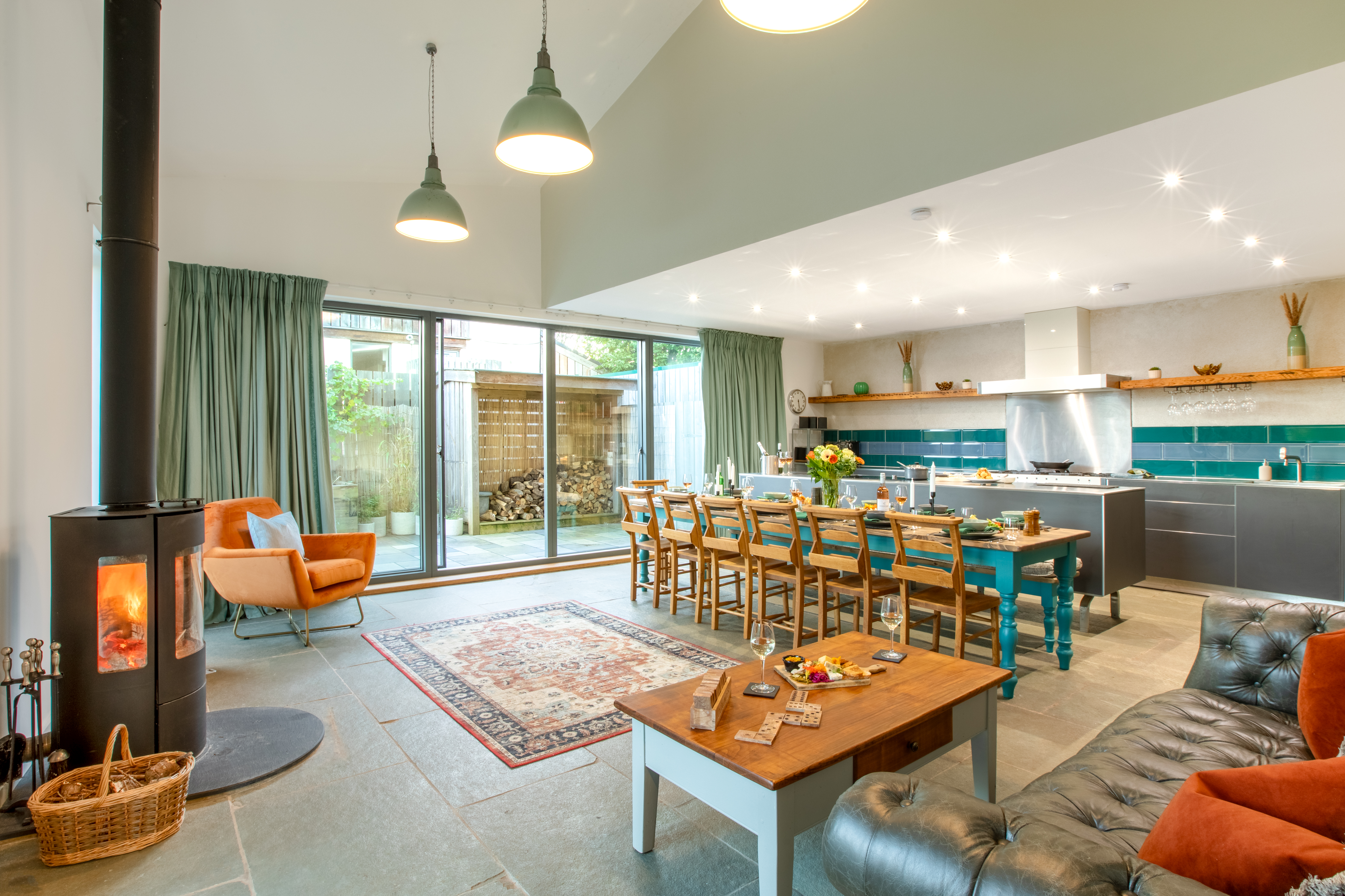 The open-plan living space at The Weston Farmhouse with floor-to-ceiling windows