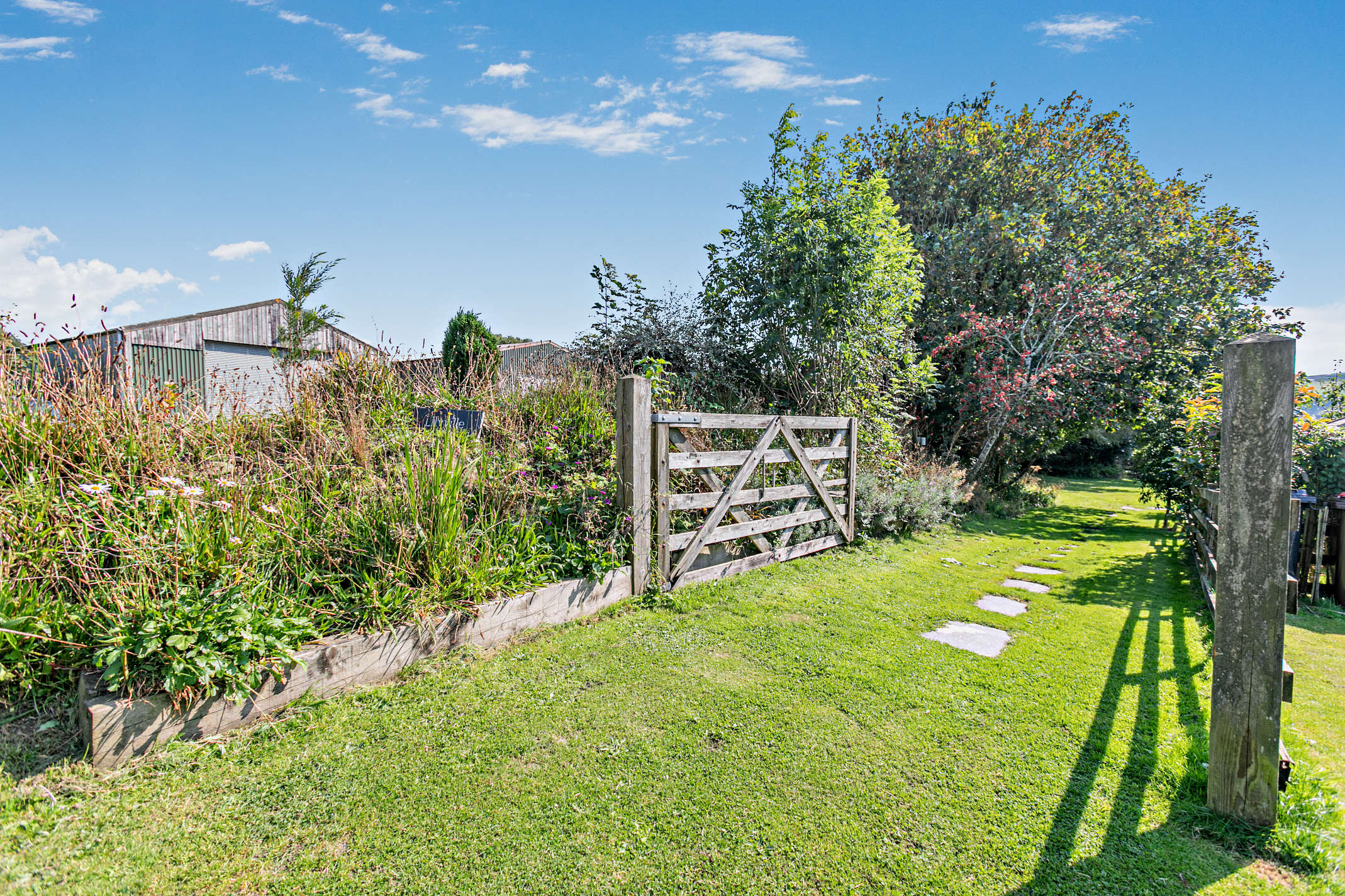 The enclosed cottage garden at Lilyville, Polbathic Cornwall