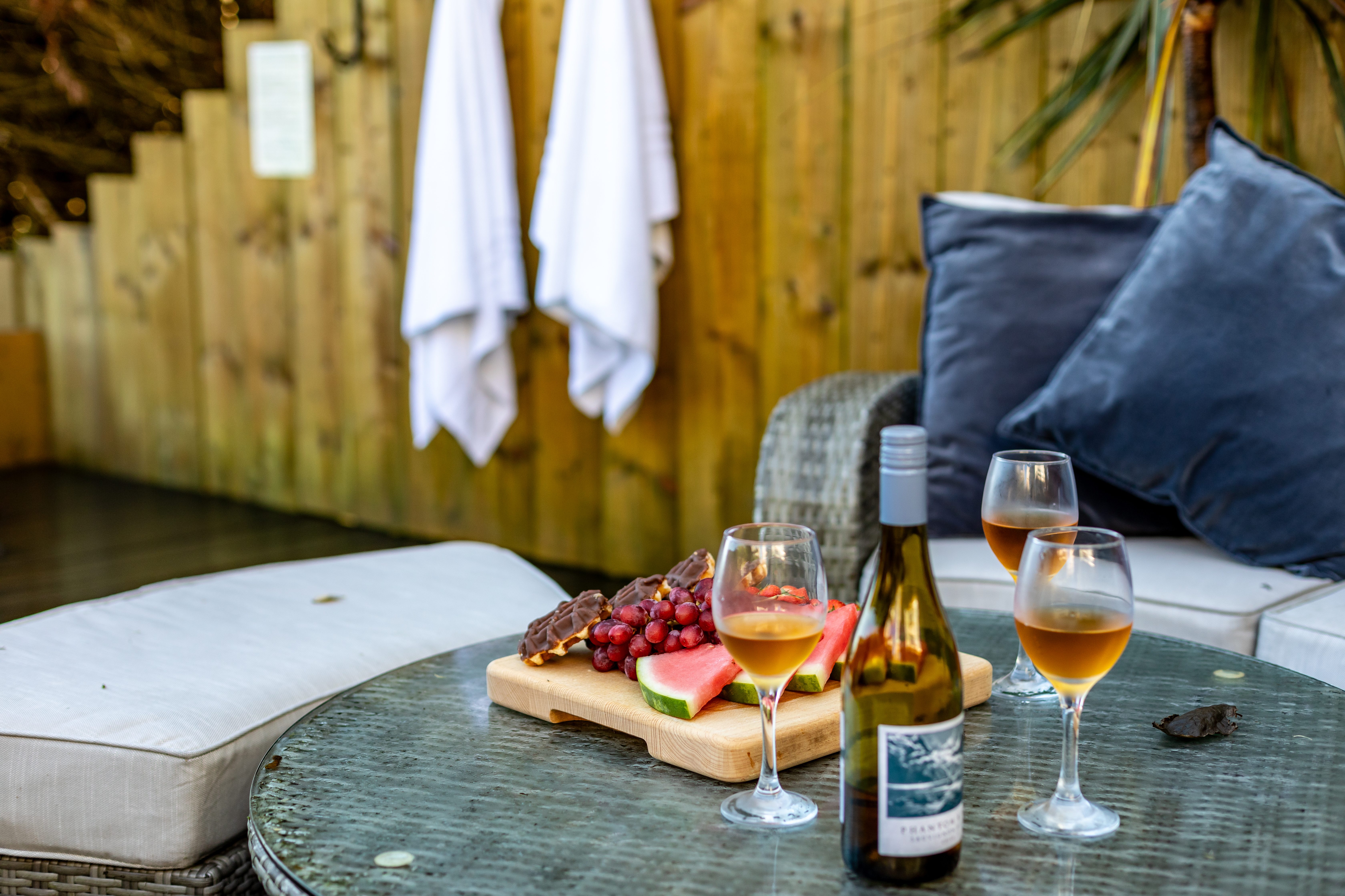 Alfresco dining on the deck at The Carbis Bay Garden House coastal house, Cornwall