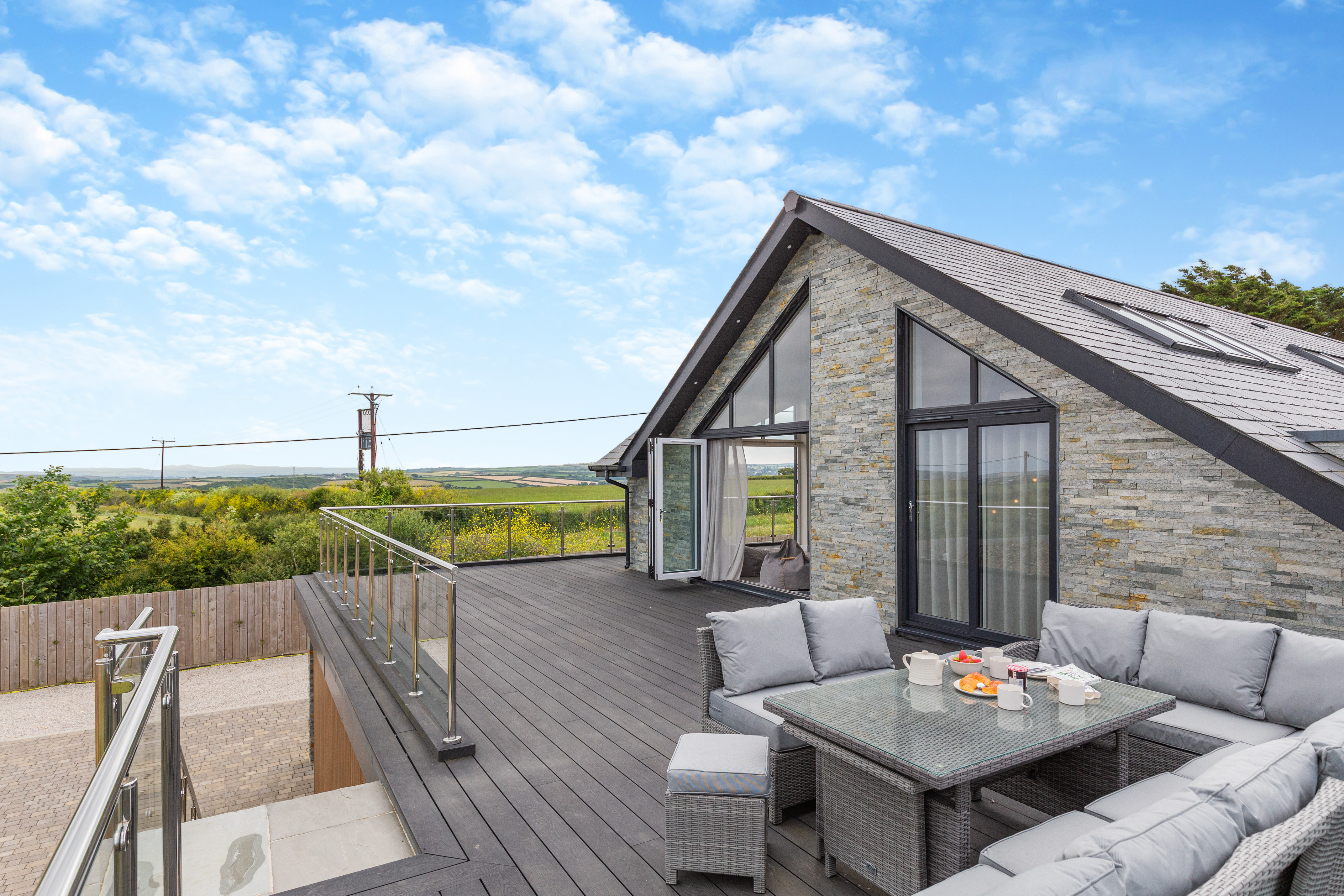 The decked balcony area at The Padstow House with estuary views, Padstow Cornwall