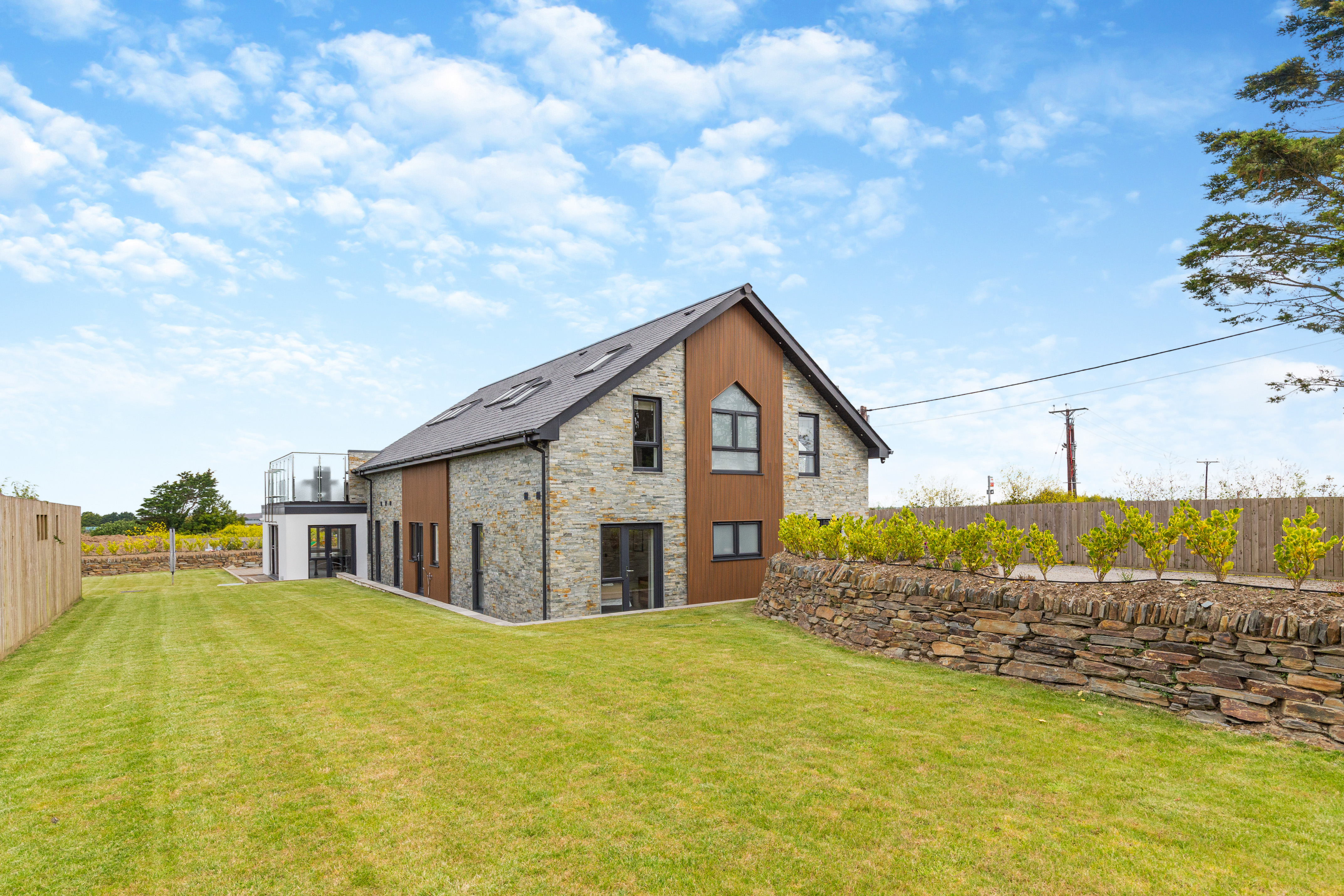 The large enclosed lawn at The Padstow House dog-friendly house, Padstow Cornwall