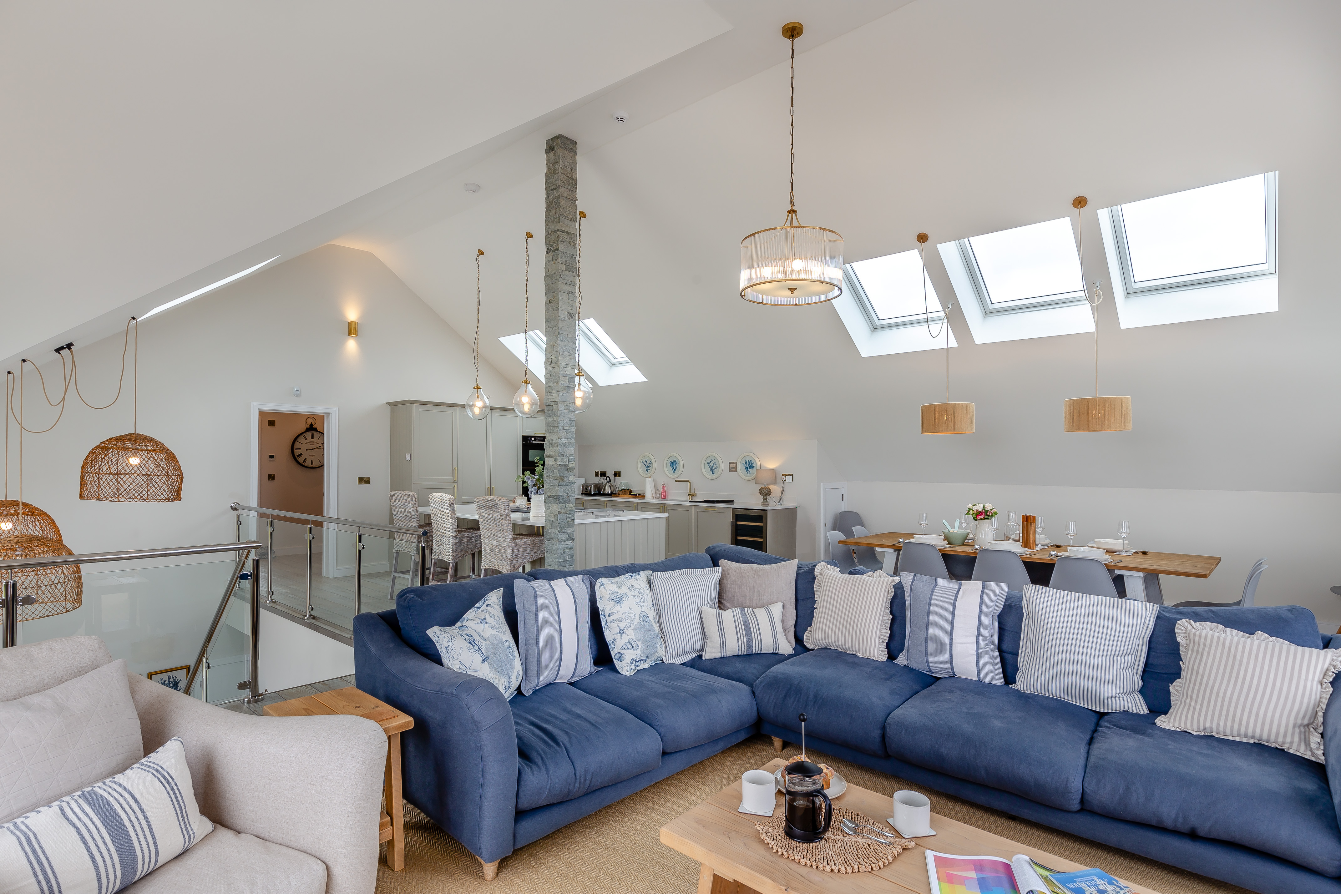 The open-plan lounge with comfortable sofas at The Padstow House, Padstow