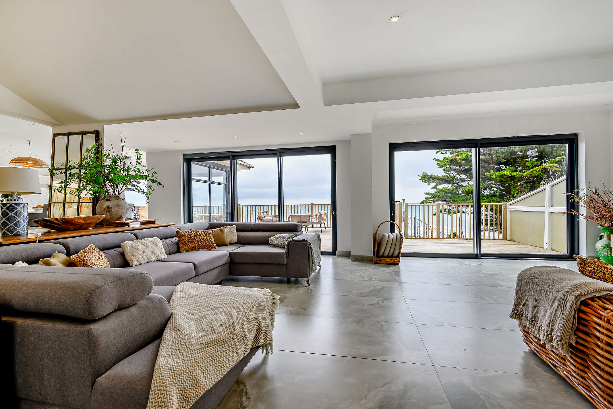 The lounge with sea views at The Downderry Cottage House, Cornwall