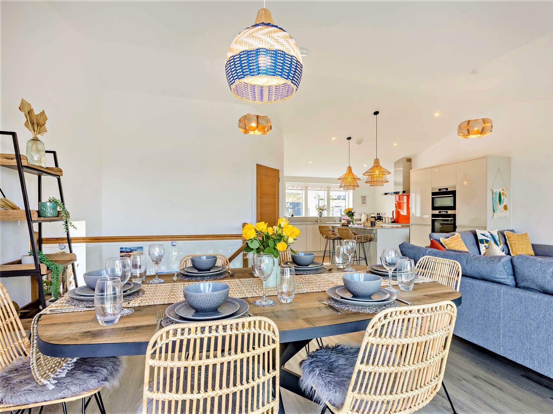 The open-plan dining area at The Appledore Garden House with estuary views