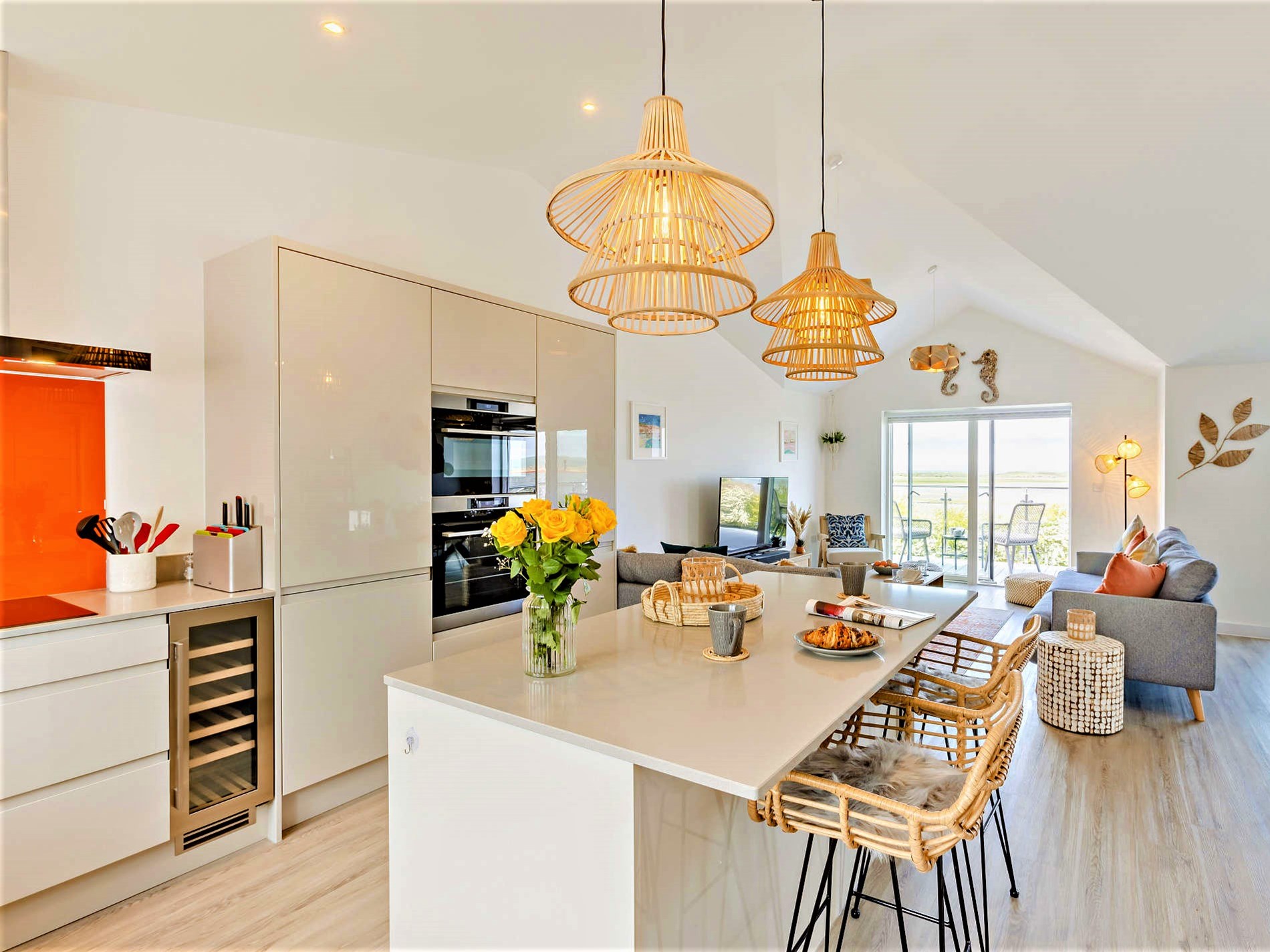 The contemporary kitchen with breakfast bar at The Appledore Garden House