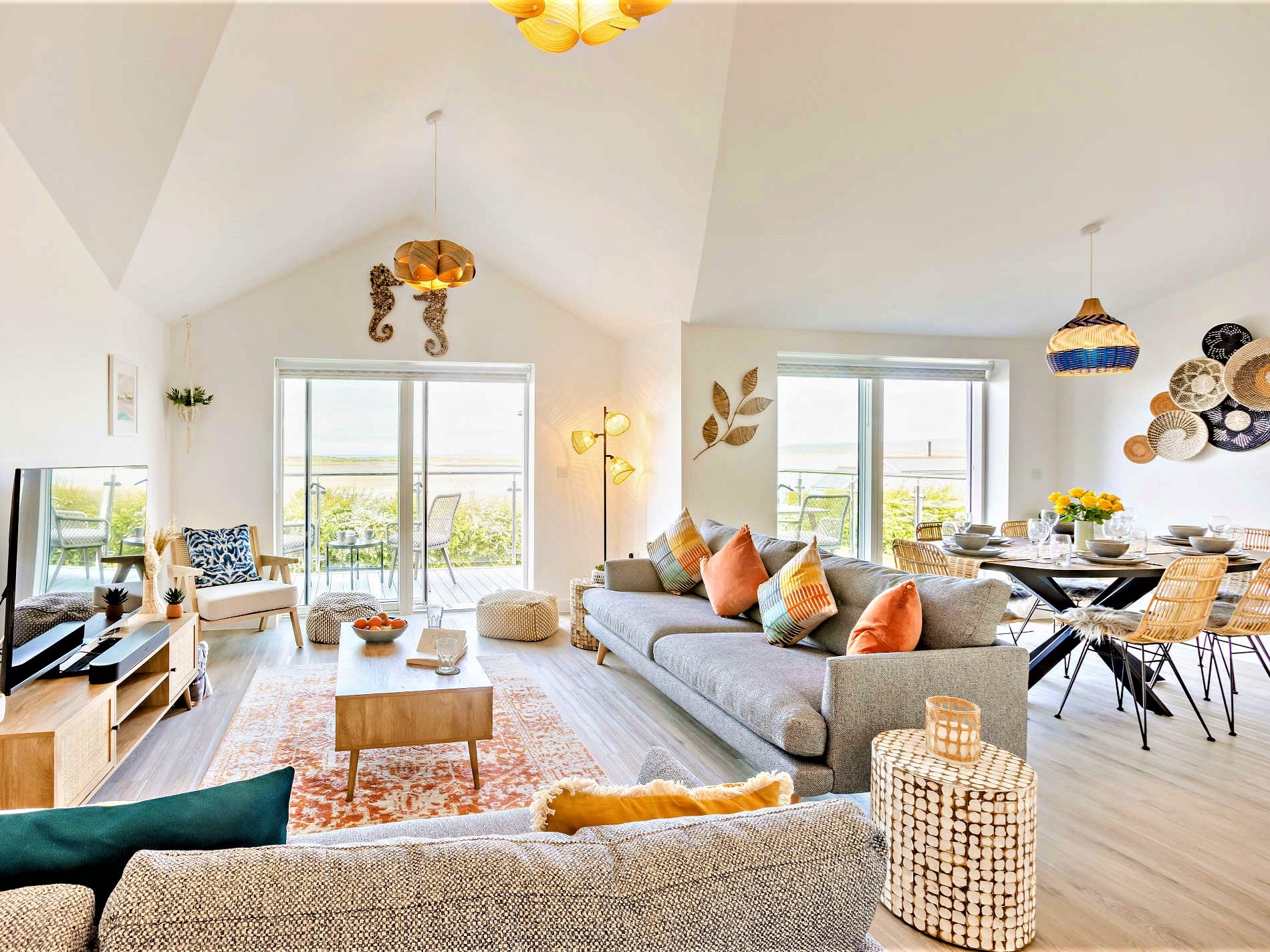 The triple-aspect lounge with picture windows at The Appledore Garden House, Appledore Devon