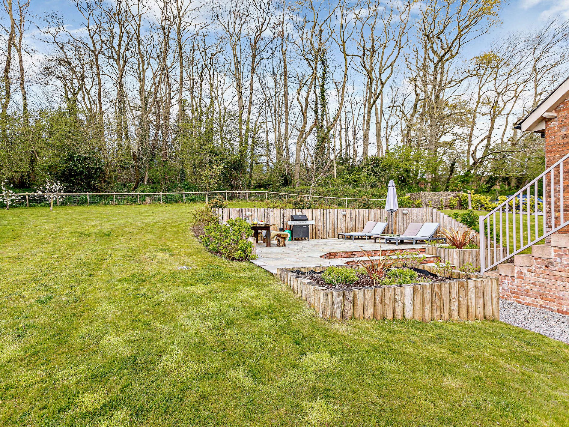 The private enclosed garden with hill views at The Payhembury Farmhouse, Payhembury Devon