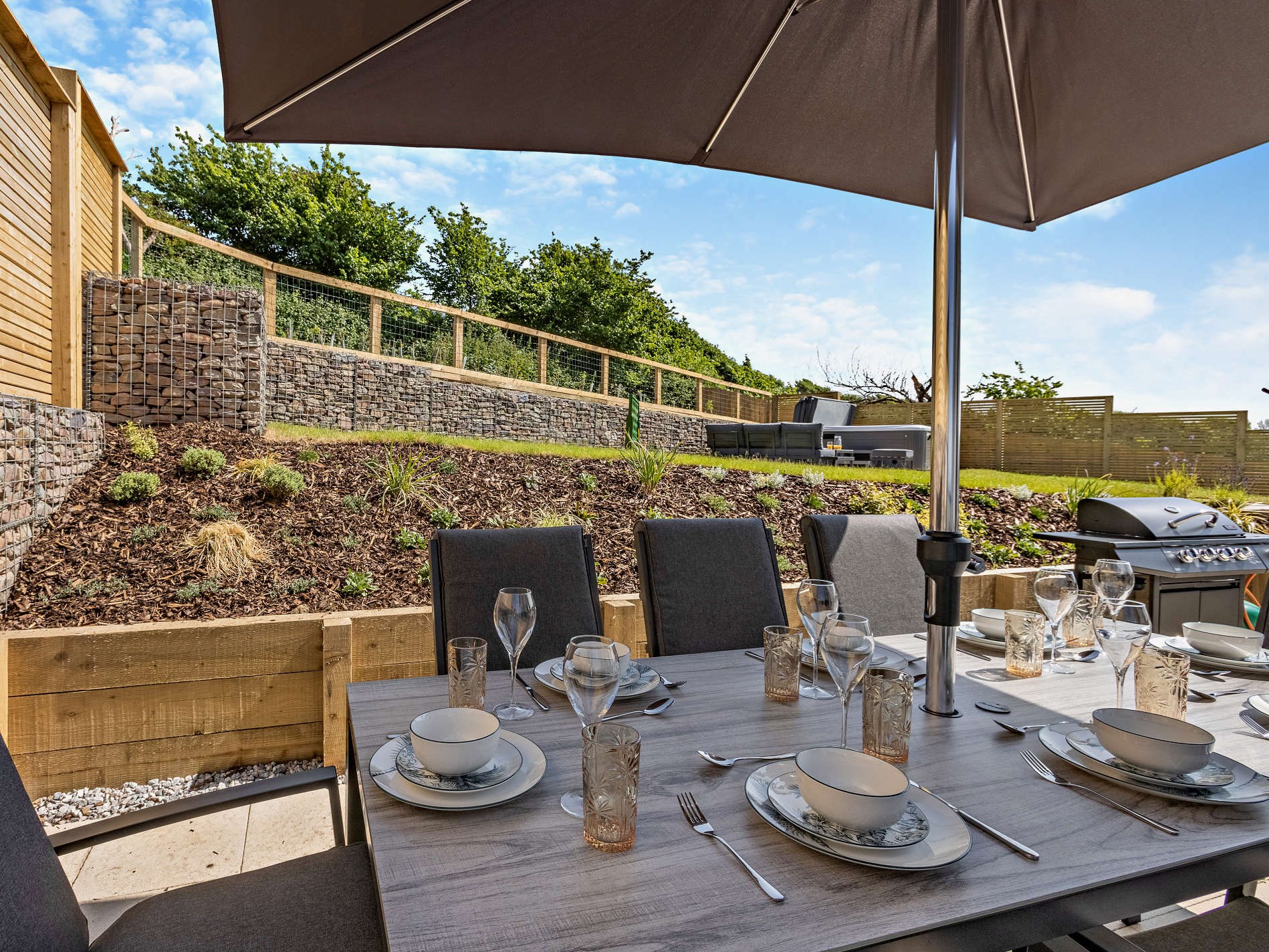 The enclosed rear patio with sea views at The Appledore House