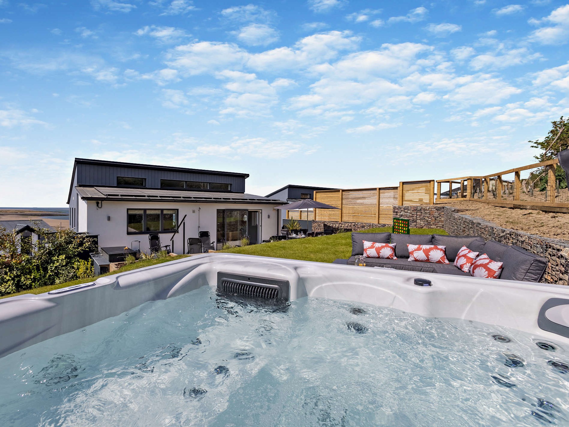 The private hot tub on the upper terrace at The Appledore House