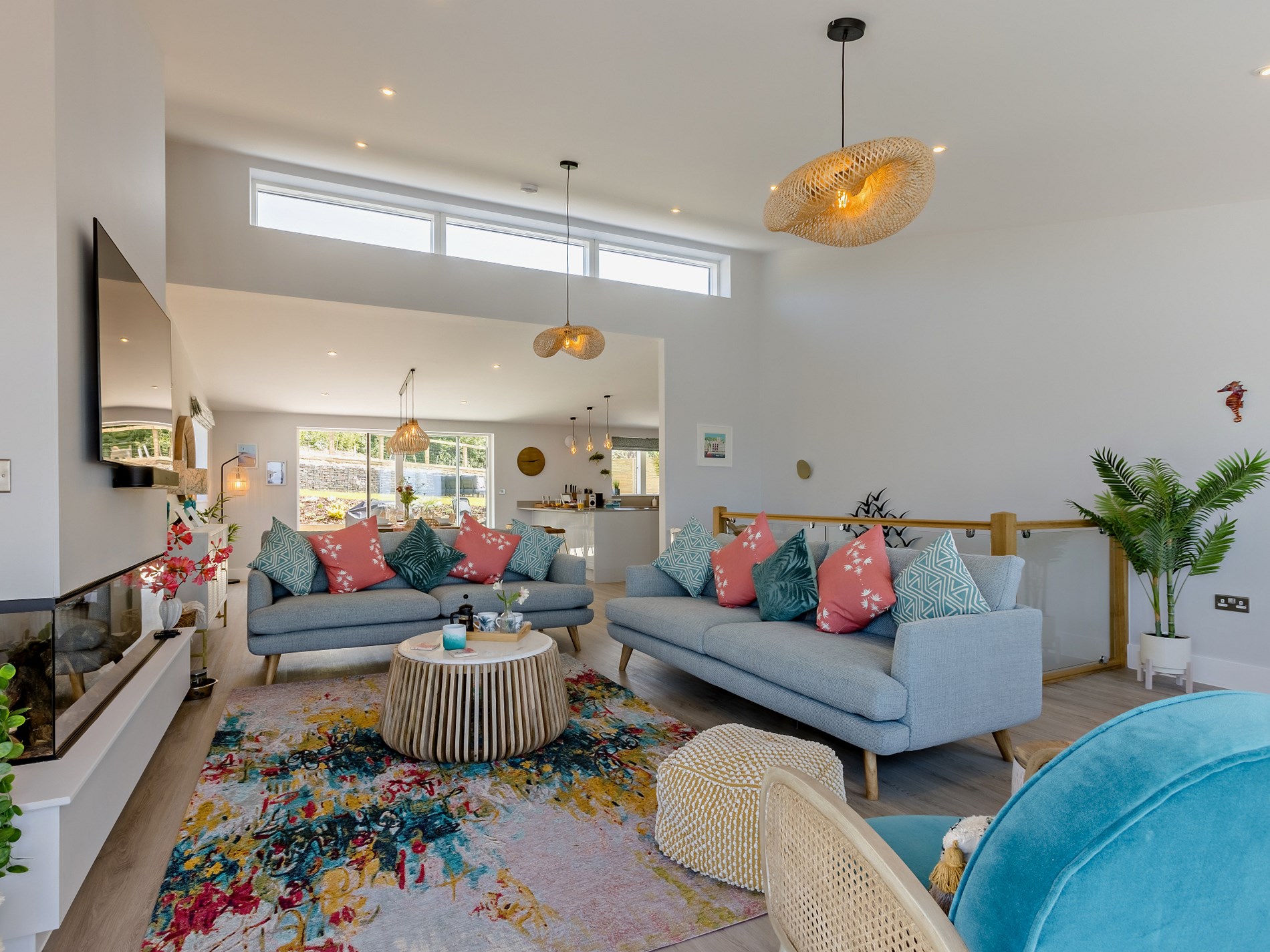 The vaulted open-plan living room with sea views at The Appledore House