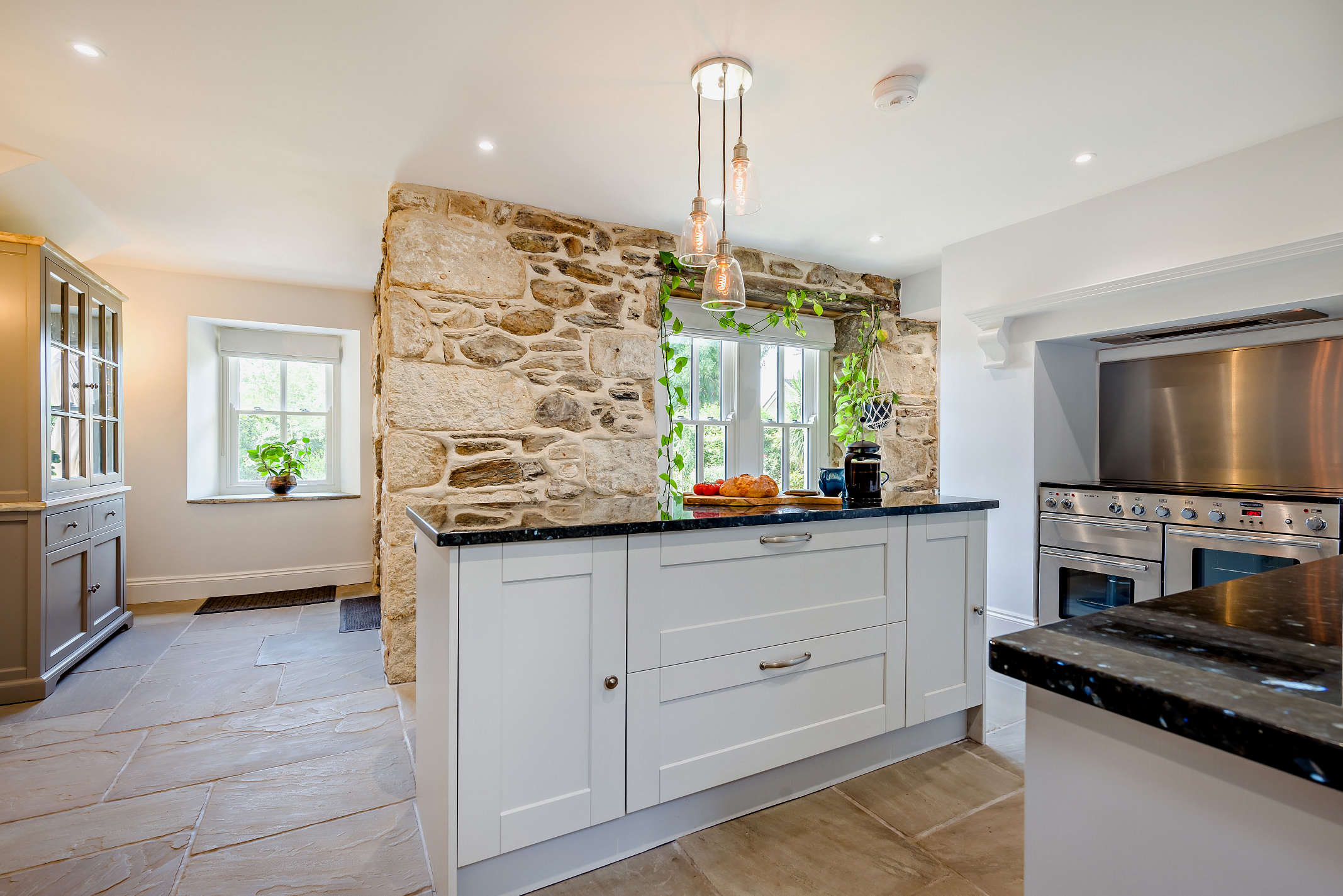 The luxurious kitchen at The Porthleven House with central island, Porthleven